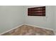 Bedroom with built in shelves, hard surface flooring, and a calming neutral color scheme at 540 W Columbia St, Lake Alfred, FL 33850