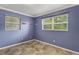 Bedroom featuring tile floors and natural light at 540 W Columbia St, Lake Alfred, FL 33850