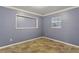 Bright bedroom with modern flooring, a window for natural light, and ample space at 540 W Columbia St, Lake Alfred, FL 33850