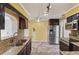 Kitchen featuring stainless steel appliances, granite countertops, and tile flooring at 540 W Columbia St, Lake Alfred, FL 33850