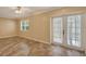 Bright room showcasing tile floors, natural light, and access to the outdoors at 540 W Columbia St, Lake Alfred, FL 33850