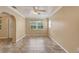 This large living room features tiled floors and an archway leading to additional rooms at 540 W Columbia St, Lake Alfred, FL 33850
