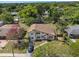 Aerial view of property showcasing landscaping, nearby homes, and neighborhood surroundings at 5420 Lido St, Orlando, FL 32807