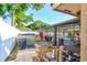Landscaped backyard features a swimming pool, patio area, storage shed, and manicured lawn at 680 Cheoy Lee Cir, Winter Springs, FL 32708