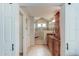 Elegant bathroom with tile floors, granite countertops, custom cabinets, and glass enclosed shower at 680 Cheoy Lee Cir, Winter Springs, FL 32708
