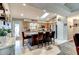Bright kitchen features a central island with seating and modern stainless steel appliances at 680 Cheoy Lee Cir, Winter Springs, FL 32708