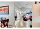 Inviting living room area with hardwood floors and comfortable leather chairs, offering a relaxing space at 680 Cheoy Lee Cir, Winter Springs, FL 32708