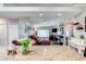 Open concept living space showcasing wood floors and views into adjacent living and office areas at 680 Cheoy Lee Cir, Winter Springs, FL 32708