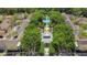 Aerial view of the community featuring manicured landscaping, a pool, and multiple residential buildings at 710 Siena Palm Dr # 104, Celebration, FL 34747
