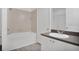 Full bathroom with a combination shower and tub, vanity with a sink, and neutral decor at 710 Siena Palm Dr # 104, Celebration, FL 34747