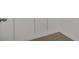 The closet is simple with a wood-look floor and white walls at 710 Siena Palm Dr # 104, Celebration, FL 34747