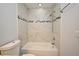 Beautifully renovated bathroom with a new tub, modern tile, and updated fixtures for a relaxing retreat at 7104 Olympia Ct # 7104, Longwood, FL 32779