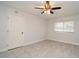 Bedroom with tile floors, closet and window providing natural light at 7104 Olympia Ct # 7104, Longwood, FL 32779