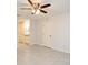 Spacious bedroom featuring tile flooring, ceiling fan, closet and neutral paint at 7104 Olympia Ct # 7104, Longwood, FL 32779