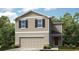 Charming two-story home features a two-car garage, neutral siding, and well-maintained landscaping at 7339 Capstone Dr, Groveland, FL 34736