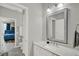 Bathroom featuring neutral countertops and colors with a glimpse of the bedroom at 8713 Iron Mountain Trl, Windermere, FL 34786