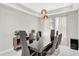Elegant dining room featuring a modern table and stylish decor at 8713 Iron Mountain Trl, Windermere, FL 34786