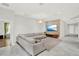 Open living area with stylish gray tile and a contemporary design aesthetic at 8713 Iron Mountain Trl, Windermere, FL 34786