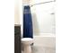 Bathroom features shower/tub, and white tile at 9033 Alba Ln, Kissimmee, FL 34747