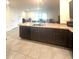 Spacious kitchen features stainless steel appliances and ample counter space at 9033 Alba Ln, Kissimmee, FL 34747