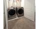 Convenient laundry room is equipped with new washer and dryer units at 9033 Alba Ln, Kissimmee, FL 34747