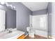 Bathroom with a tub and shower combo, single sink vanity, and tile floors at 1033 Sabine Pl, Kissimmee, FL 34759