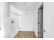 Laundry room featuring tile flooring, basic shelfing, and appliance hook ups at 1033 Sabine Pl, Kissimmee, FL 34759