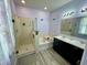 Bathroom featuring a separate shower and tub, double vanity sinks, and modern fixtures at 113 San Mardeen Ct, Daytona Beach, FL 32117