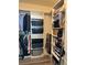 Organized walk-in closet with ample shelving, hanging space, and storage bins at 113 San Mardeen Ct, Daytona Beach, FL 32117