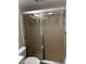 Bathroom with enclosed glass door shower at 120 Hibiscus Woods Ct # 11B, Deltona, FL 32725