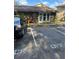 Exterior of the community office with designated parking and building entrance at 120 Hibiscus Woods Ct # 11B, Deltona, FL 32725