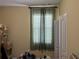 Bedroom with window, curtains and boxes at 12728 Boggy Pointe Dr, Orlando, FL 32824