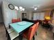 Inviting dining area seamlessly connects to the living room, creating a spacious entertaining space at 12728 Boggy Pointe Dr, Orlando, FL 32824