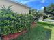 View of home exterior featuring the beautiful greenery at 12728 Boggy Pointe Dr, Orlando, FL 32824