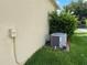 A home exterior showing the air conditioning unit at 12728 Boggy Pointe Dr, Orlando, FL 32824