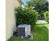 Home exterior featuring the air conditioning unit at 12728 Boggy Pointe Dr, Orlando, FL 32824