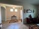 Welcoming entrance featuring tile flooring, decorative accents, and an open view into the living spaces at 12728 Boggy Pointe Dr, Orlando, FL 32824