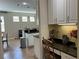 Cozy built-in office nook with granite countertop and storage cabinets at 12728 Boggy Pointe Dr, Orlando, FL 32824