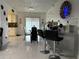 Open-concept dining area with stylish bar seating and modern lighting at 1310 Briarwood Ave, Deltona, FL 32725
