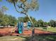 Colorful playground featuring slides, ladders, and climbing structures, perfect for outdoor fun at 1310 Briarwood Ave, Deltona, FL 32725