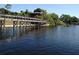 Waterfront with a beautiful pier and lake views at 1310 Briarwood Ave, Deltona, FL 32725