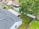Aerial view of backyard, screened porch, and white privacy fence at 1322 Ravida Woods Dr, Apopka, FL 32703
