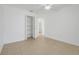 Bedroom featuring a ceiling fan and a closet with adjustable shelving at 1322 Ravida Woods Dr, Apopka, FL 32703
