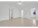 Large bedroom features tile floor, two closets and ensuite bath at 1322 Ravida Woods Dr, Apopka, FL 32703