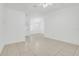 Spacious living room with tile floors, natural light, and neutral paint palette at 1322 Ravida Woods Dr, Apopka, FL 32703