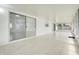 Sunroom features tiled floor, sliding glass door, a side window, and access to the exterior at 1322 Ravida Woods Dr, Apopka, FL 32703