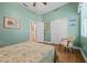 The bedroom features wood floors, a chair, and a closet for storage at 13838 Bluebird Park Rd, Windermere, FL 34786