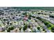 This aerial shot shows the neighborhood and proximity to local shopping and highways at 1614 Oak Hill Trl, Kissimmee, FL 34747