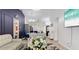 The living room features luxury vinyl floors, modern lighting, and a decorative accent wall at 1614 Oak Hill Trl, Kissimmee, FL 34747