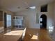 Bright living room featuring vaulted ceilings, hardwood floors and an open-concept layout at 1797 Tillstream Dr, Orlando, FL 32818